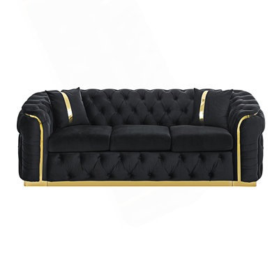 Canapé Chesterfield de luxe capitonné