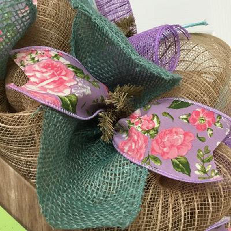 Couronne de printemps avec nichoir pastel