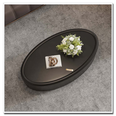 33.46 Inch Oval Hidden Storage Coffee Table with Premium Leather Upholstery