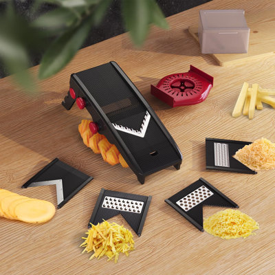 This Black Multi-Functional Kitchen Slicer Is Adjustable And Can Chop, Shred, And Slice Vegetables, Fruits, Cheese, And Potato Chips.