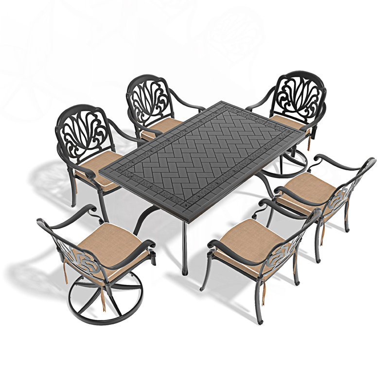 L'ensemble de salle à manger 7 pièces comprend 2 chaises pivotantes, 4 chaises et une table rectangulaire