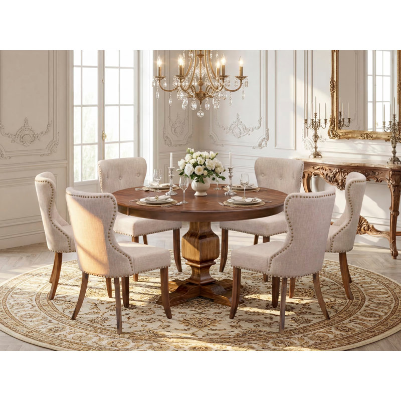 L'ensemble de table de cuisine 7 pièces se compose d'une table à piédestal et de 6 chaises rembourrées en lin brun clair avec capitonnage à boutons - noyer antique