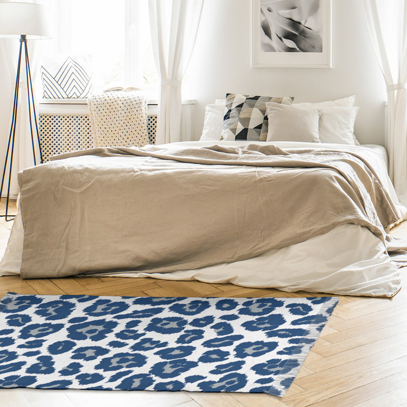 Tapis blanc / bleu marine à imprimé animal