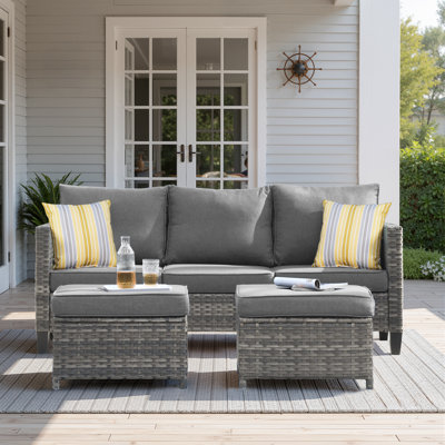 Harbin 76.77" Wide Outdoor Wicker Patio Sofa with Cushions
