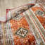 Sunia Southwestern Area Rug in Red-1595836112
