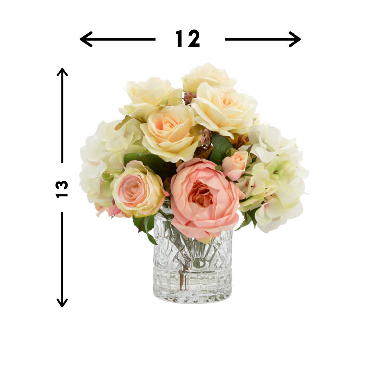 Arrangements floraux mixtes dans un vase
