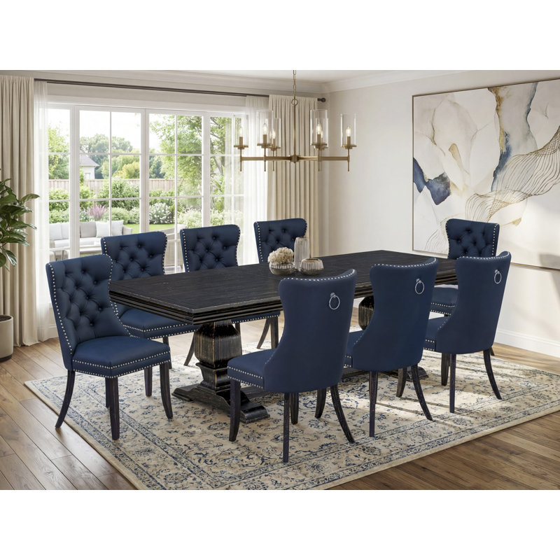 9-piece kitchen table set includes a dinner table and 8 Navy Blue Polyester fabric dining Chairs with Button Tufted Chair Back - Sand Blasting Black Finish.