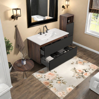 Meubles-lavabos modernes avec lavabo intégré et grand espace de rangement, offerts en noir et noyer.