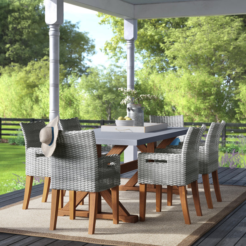Fleur 6 - Person Premium All-Weather Wicker Patio Dining Set with Rectangular Table , Cushions Included