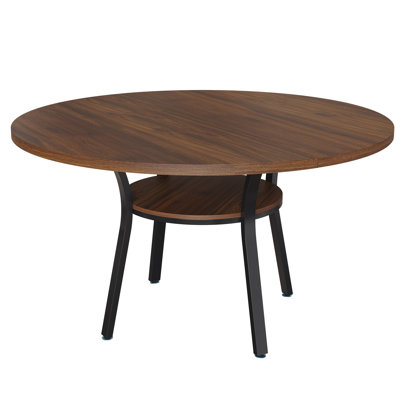 Table ronde pour 4 à 6 personnes, idéale pour les petits espaces. Table de cuisine compacte avec tablette de rangement inférieure et structure métallique robuste. Table seule.