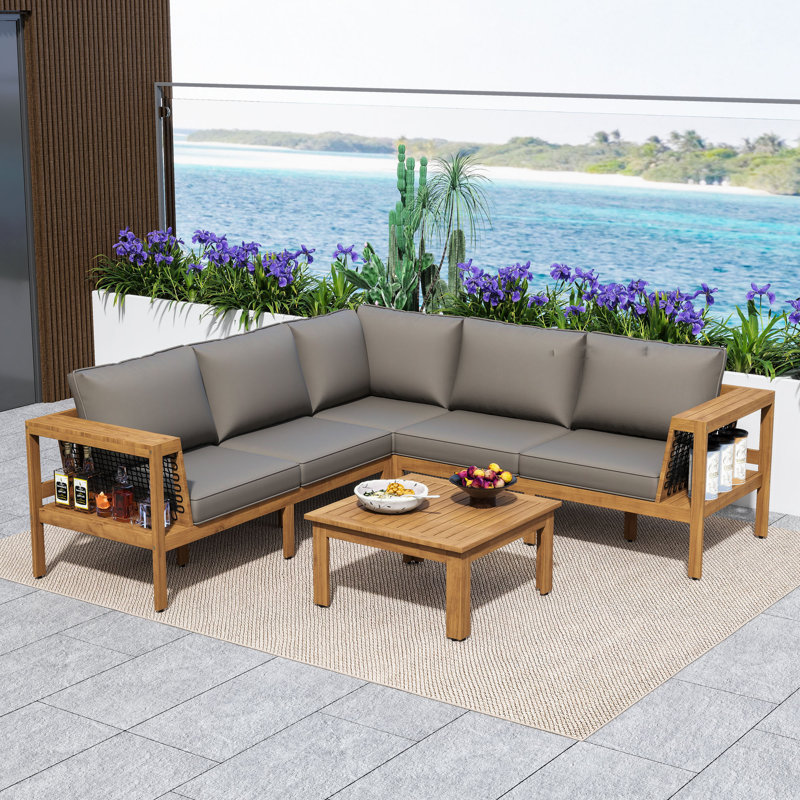 Ensemble de conversation modulaire en L 4 pièces en bois d'acacia avec table basse et coussins pour patio, terrasse ou bord de piscine