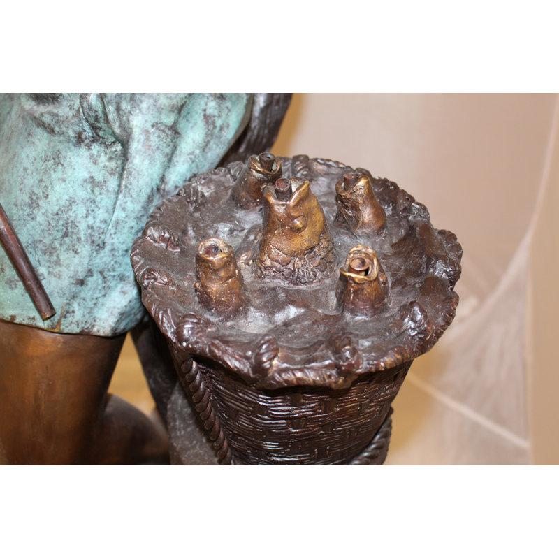Boy Sitting on a Tree and Fishing Bronze Statue -  Size: 34"L x 28"W x 64"H. 