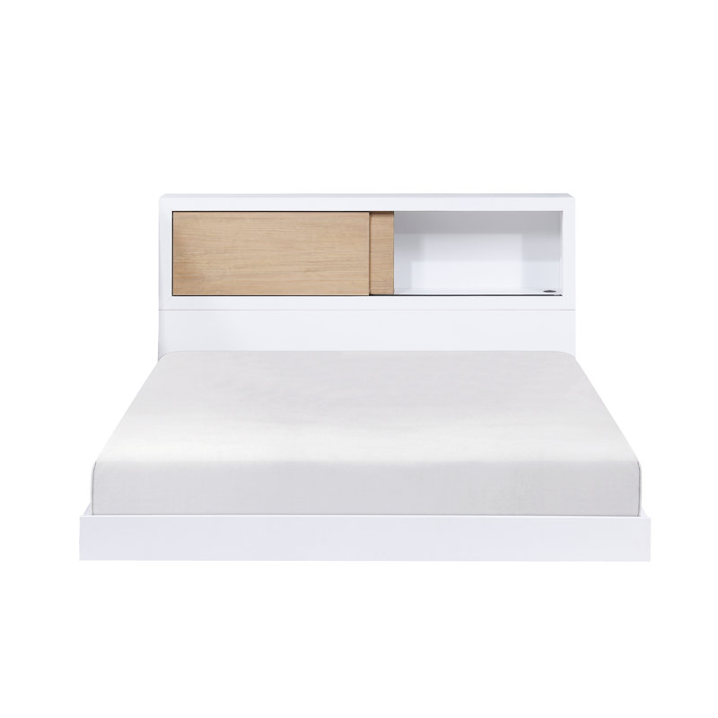 Lit de tête de lit bibliothèque fonctionnel pour chambre d'enfant, offrant rangement et confort pour un espace bien organisé et relaxant.
