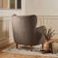 Fauteuil club à oreilles rembourré