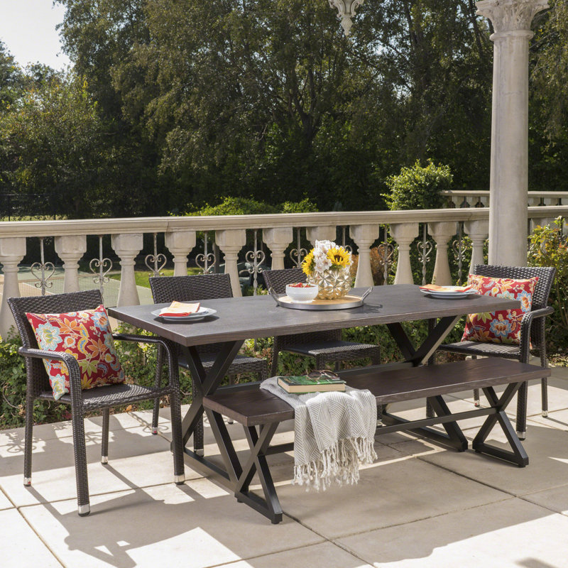 Olcott 6 - Person Wicker Patio Dining Set with Rectangular Table