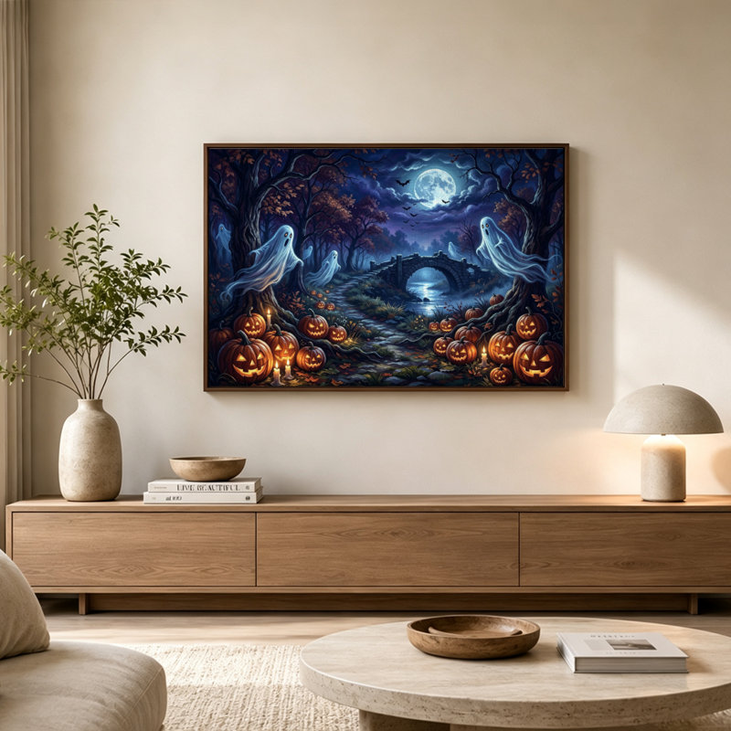 Tableau sur toile éthéré représentant des fantômes de la forêt d'Halloween et des citrouilles sculptées, avec cadre flottant, prêt à être accroché.