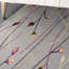 Tapis gris à motif floral Aratrika-133573509
