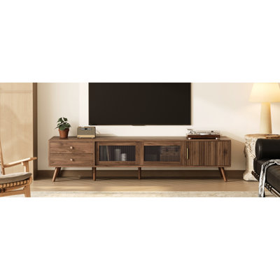 Meuble télé 76 po pour téléviseur de 70 à 79 po, console média moderne à grain de bois et portes en verre dans le salon, charnières à fermeture en douceur et rangement dissimulé jusqu'à 85 pieds, meuble audio-vidéo et chambre à coucher, armoires