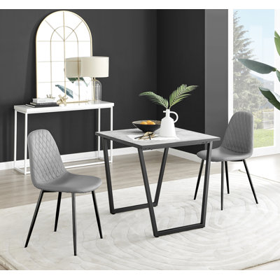 Table de salle à manger et chaises en mélamine effet marbre Carzon - Chaises de salle à manger en similicuir de luxe