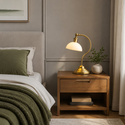 A White Jade Glass Shade and 180° Swivel Head Top This Antique Brass Cordless LED Banker-Style Lamp, with Rechargeable Battery Operation, 3-Level Dimming, and Universal USB-C Charging