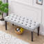 Repose-pieds capitonné en velours Heng Ming-558587302