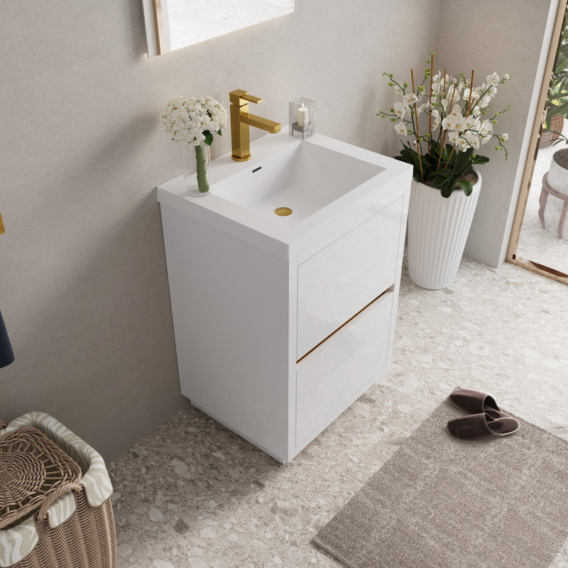 Meuble-lavabo de 24 po avec lavabo, blanc brillant. Facile à installer. Rangement généreux. Comptoir en résine de qualité. Armoire en bois pré-assemblée pour plus de simplicité. Bois