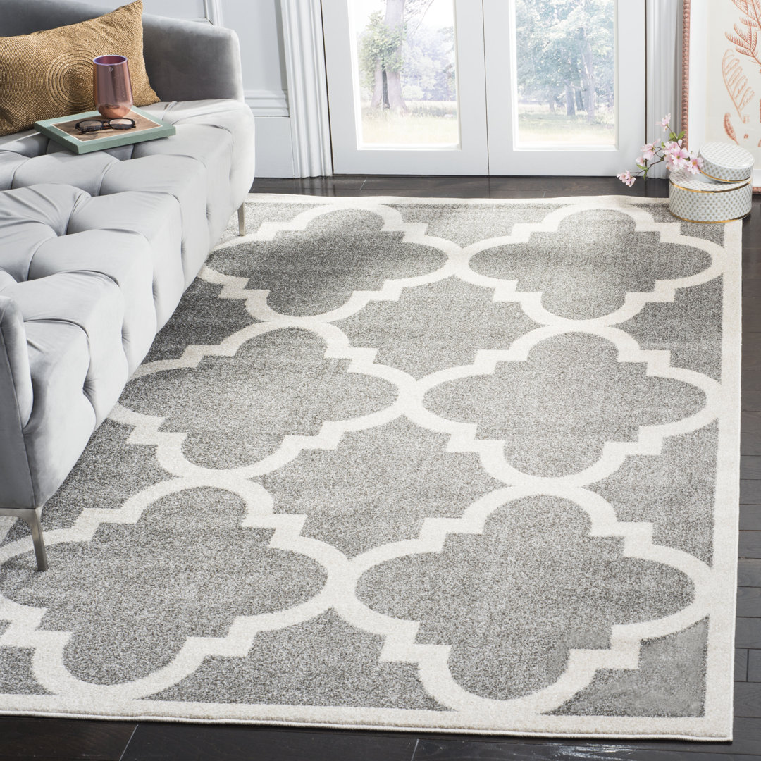 Kathy Geometric Hand Woven Indoor / Outdoor Area Rug