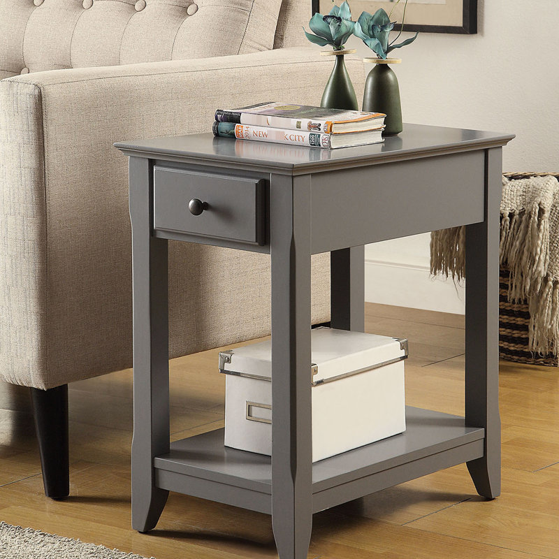 Table grise avec tablette de rangement inférieure ouverte et structure de pieds rectangulaire en dessous