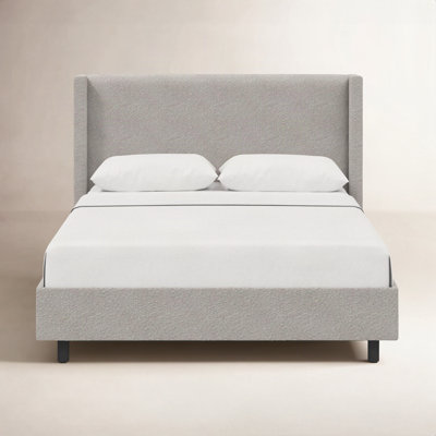 Hanson Upholstered Wingback Platform Bed