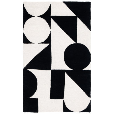 Tapis ivoire / noir en laine touffeté à la main à motif géométrique