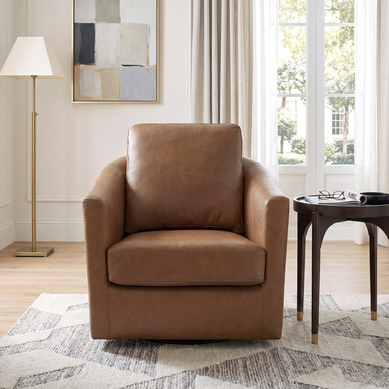 Fauteuil pivotant Vance 33 po moderne et contemporain en cuir pleine fleur assorti, avec base pivotante à 360 degrés, siège à ressorts ensachés et coussins amovibles à fermeture éclair.