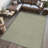 Waylynn Classic Solid Low-Pile Machine-Washable Sage Green Rug-1923259352