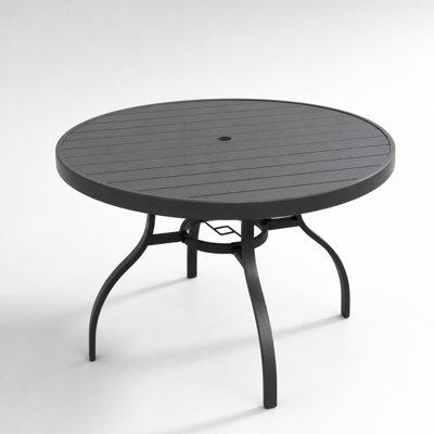 Table de salle à manger ronde pour l'intérieur et l'extérieur, de style industriel moderne avec structure métallique robuste et plateau imitation bois