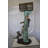 Boy Sitting on a Tree with Mailbox Bronze Statue -  Size: 22"L x 23"W x 49"H. 