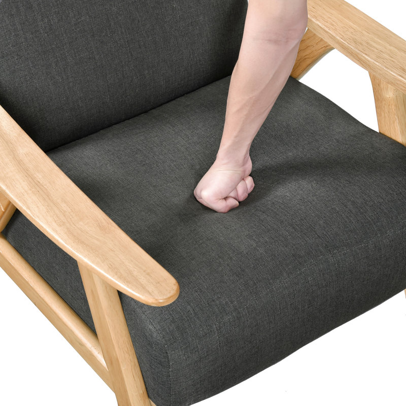 Chaise moderne et confortable en tissu gris foncé, base en bois massif et fauteuil à ressorts ensachés, revêtement en tissu texturé pour le salon
