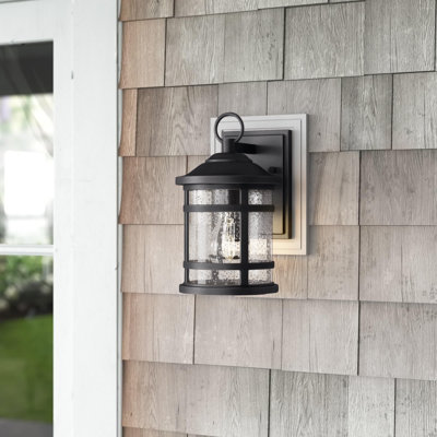 Maxeys 11.75 in. H 1-Light Matte Black Outdoor Wall Sconce, Rust-Resistant Composite, Clear Seeded Glass Shade, LED Compatible, Use for Exterior Porch Patio Front Door or Garage