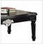 Table basse noire avec pieds tournés