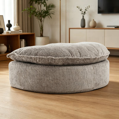 Confortable repose-pieds de canapé autonome, parfait pour la détente et une utilisation multifonctionnelle dans les espaces de vie modernes.