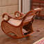 Chaise berçante en rotin naturel