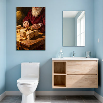 Cadeau de Noël père Noël avec ruban doré