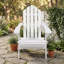 Chaise Adirondack pliable en bois d'acacia avec siège à lattes, accoudoirs droits et dossier incliné pour terrasse-2002453236