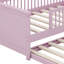 Lit plateforme en bois avec garde-corps et lit gigogne-313039924