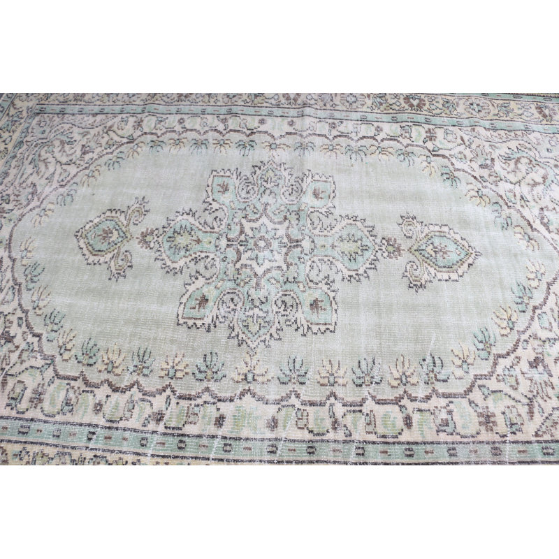 Grand tapis vert en laine pour votre salon avec un design turc antique