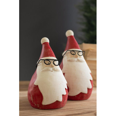 SET OF TWO CEMENT SANTAS WITH GLASSES