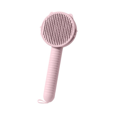 a comb Pet Combing Brush With Hair Removal Button Pet Hair Cleaner Brush  Self Cleaning