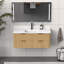 Meuble-lavabo cannelé en chêne doré avec lavabo intégré et quincaillerie noire