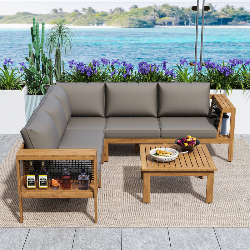 Ensemble de conversation modulaire en L 4 pièces en bois d'acacia avec table basse et coussins pour patio, terrasse ou bord de piscine