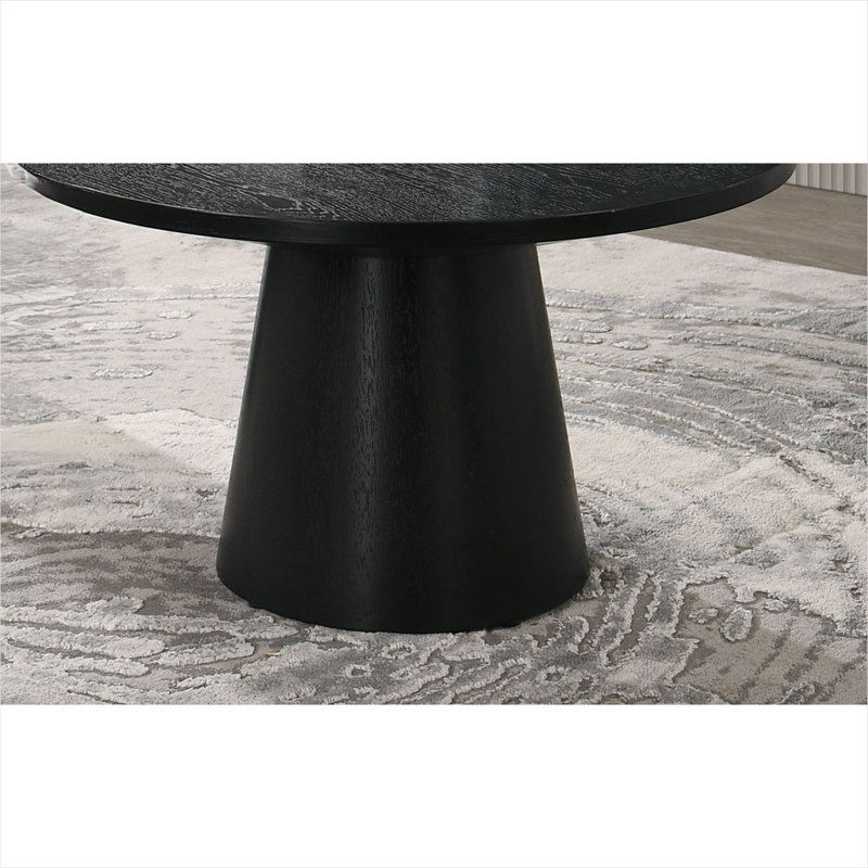 Table basse ronde de couleur noire avec base à piédestal conique, style moderne et contemporain pour le salon