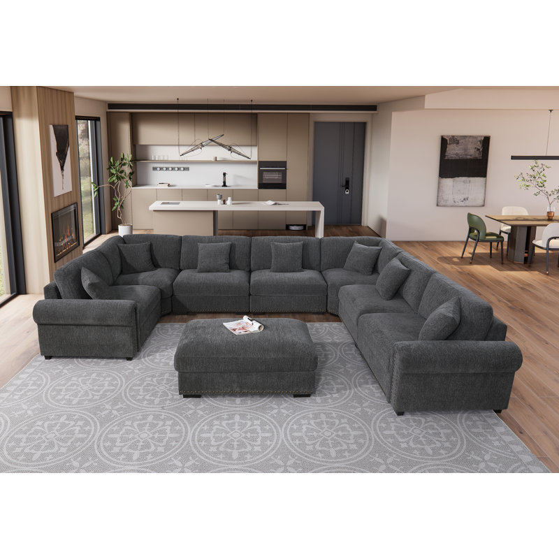 Errett Modern Fabric Reversible 8 Seater Corner Sectional With Movable Ottoman, Dark Gray Polyester