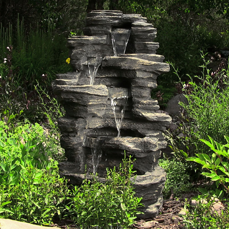 Fontaine d'extérieur en pierre avec lumières en pierre synthétique Varner Rocky Falls